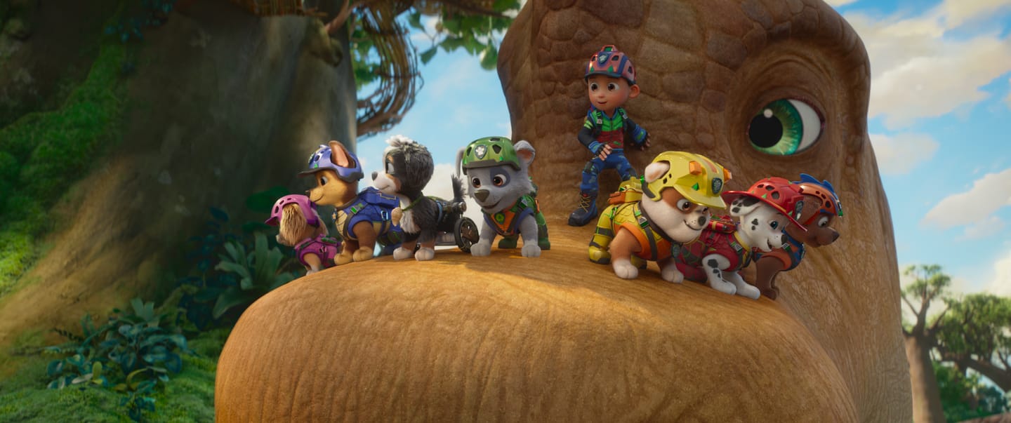 Mckenna Grace as “Skye”, Rain Janjua as “Chase”, Hayden Chamberlen as “Rex", William Desrosiers as “Rocky”, Henry Bolan as “Ryder”, Lucien Duncan-Reid as “Rubble”, Carter Young as “Marshall”, and Nylan Parthipan as “Zuma" in PAW Patrol: The Dino Movie from Paramount PIctures and Spinmaster. 