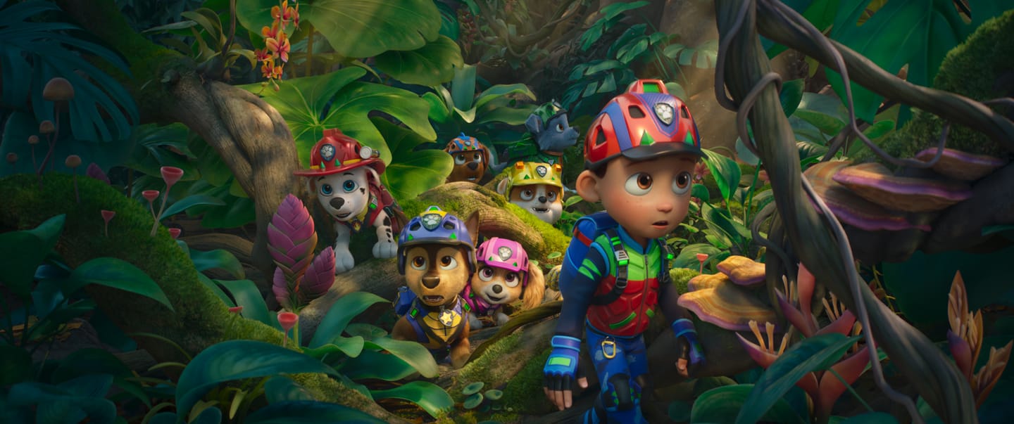 Henry Bolan as “Ryder”, Rain Janjua as “Chase”, Mckenna Grace as “Skye”, Carter Young as “Marshall”, Lucien Duncan-Reid as “Rubble”, Nylan Parthipan as “Zuma", and William Desrosiers as “Rocky” in PAW Patrol: The Dino Movie from Paramount PIctures and Spinmaster. 